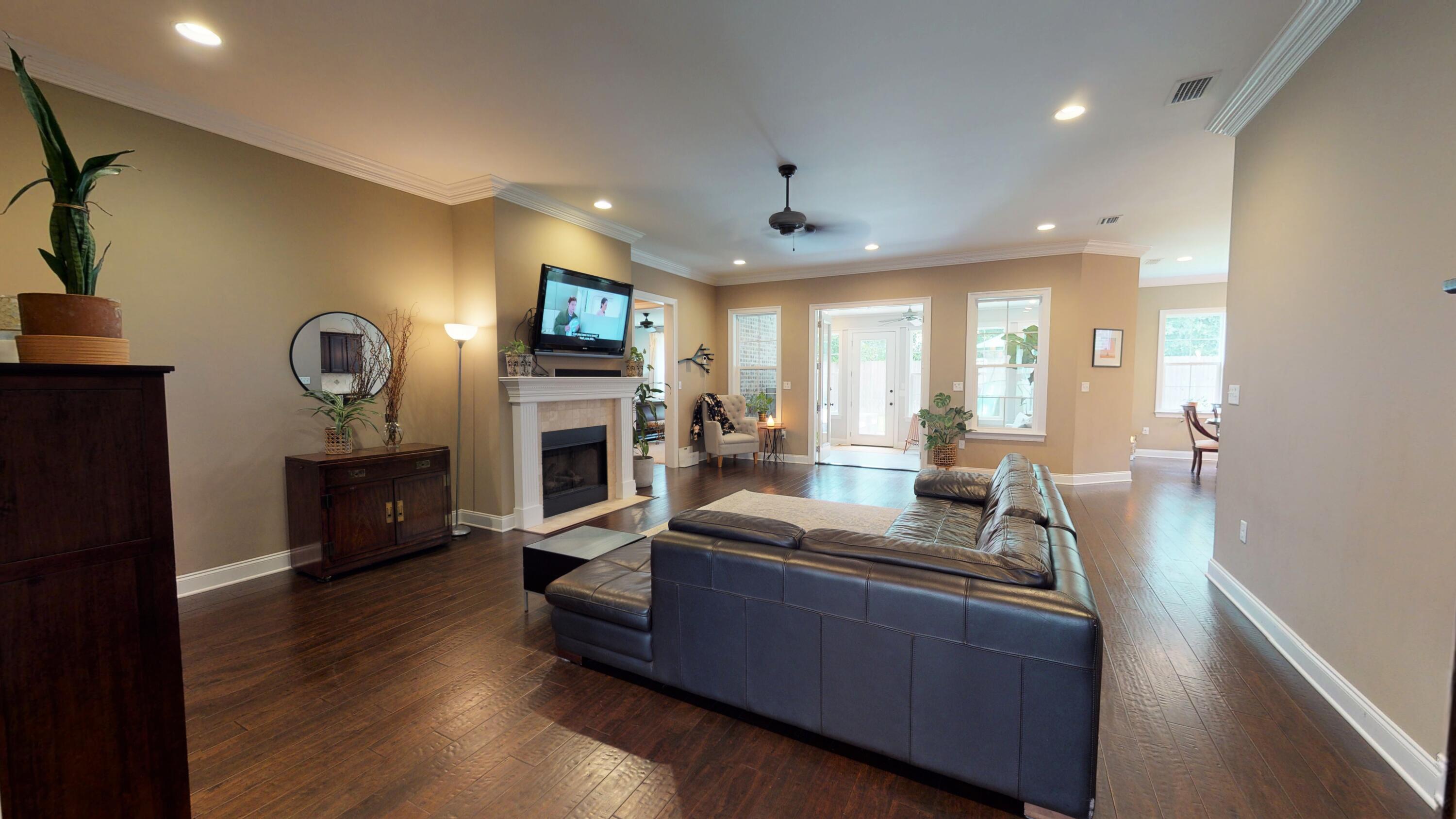 35 Derby Downs Circle Niceville, FL 32578 - Photo 6 of 51 a living room with furniture and a fireplace