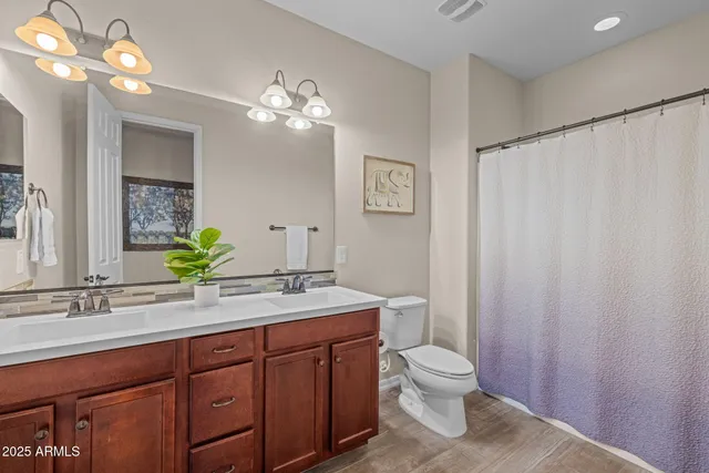 a view of a backyard with sitting area