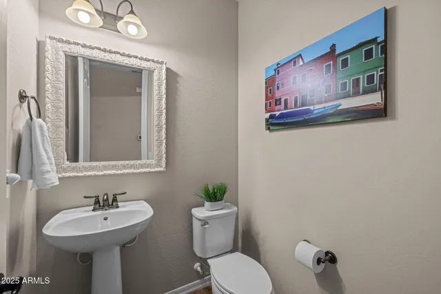 a view of a patio with a table chairs and a backyard