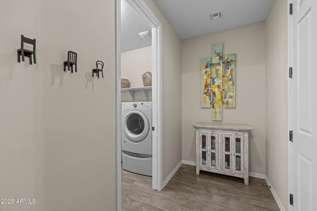 a view of a swimming pool with outdoor seating