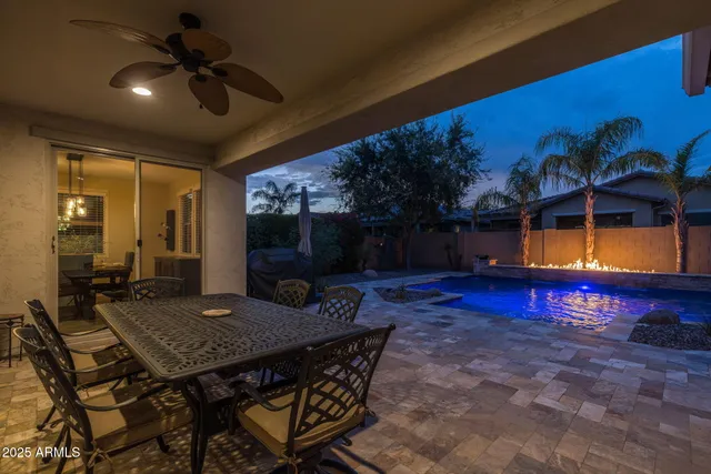 a view of a backyard with a patio