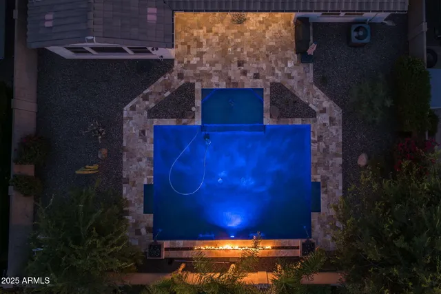 a outdoor living space with furniture and a fireplace