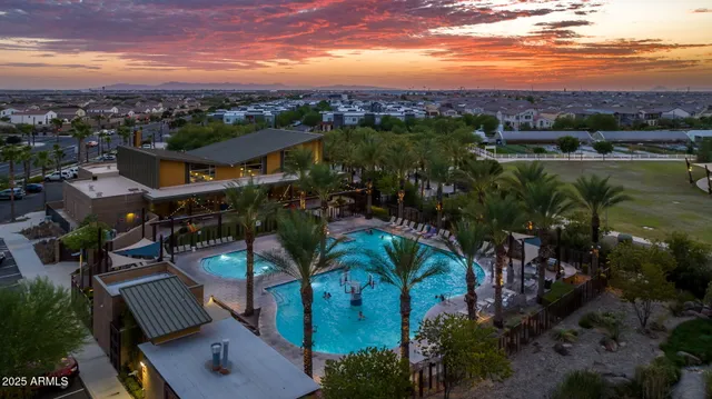 a view of a swimming pool with a patio