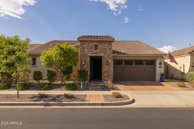 a view of a house with a street