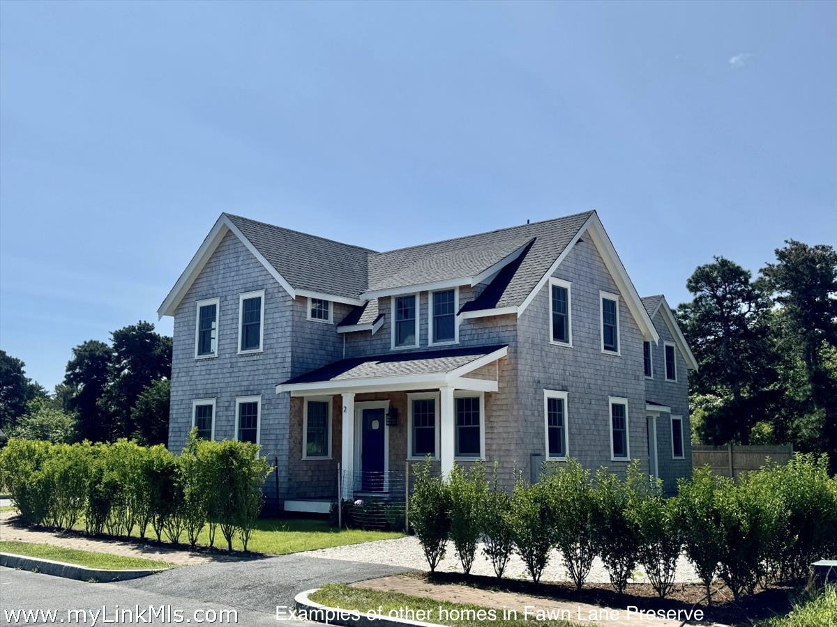 4 Fawn Lane Nantucket, MA 02554 - Photo 7 of 8 a front view of a house with a yard