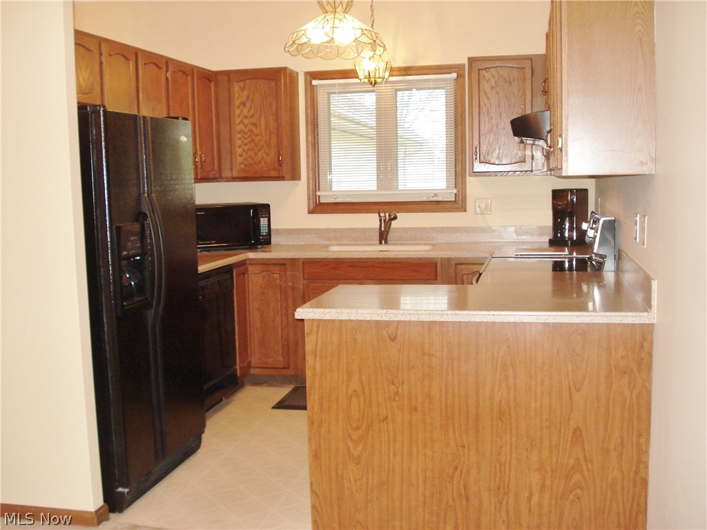 669 Barrett Road Berea, OH 44017 - Photo 8 of 20 Remodeled kitchen with hard surface counters. All kitchen appliances stay.