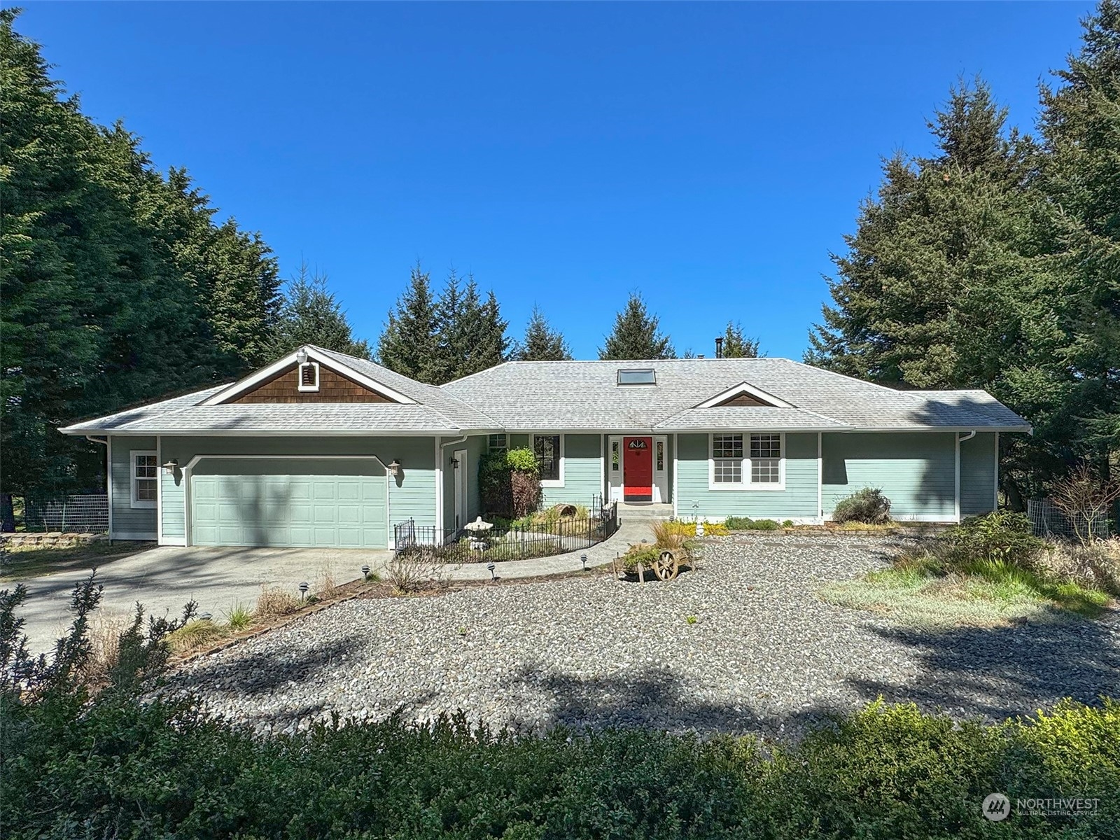 110 Henkes Road Sequim, WA 98382 - Photo 1 of 40 a front view of a house with garden