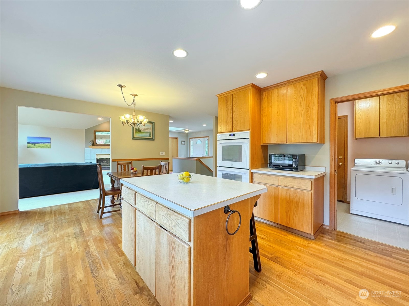 110 Henkes Road Sequim, WA 98382 - Photo 13 of 40 a kitchen with a sink a counter top space and stainless steel appliances
