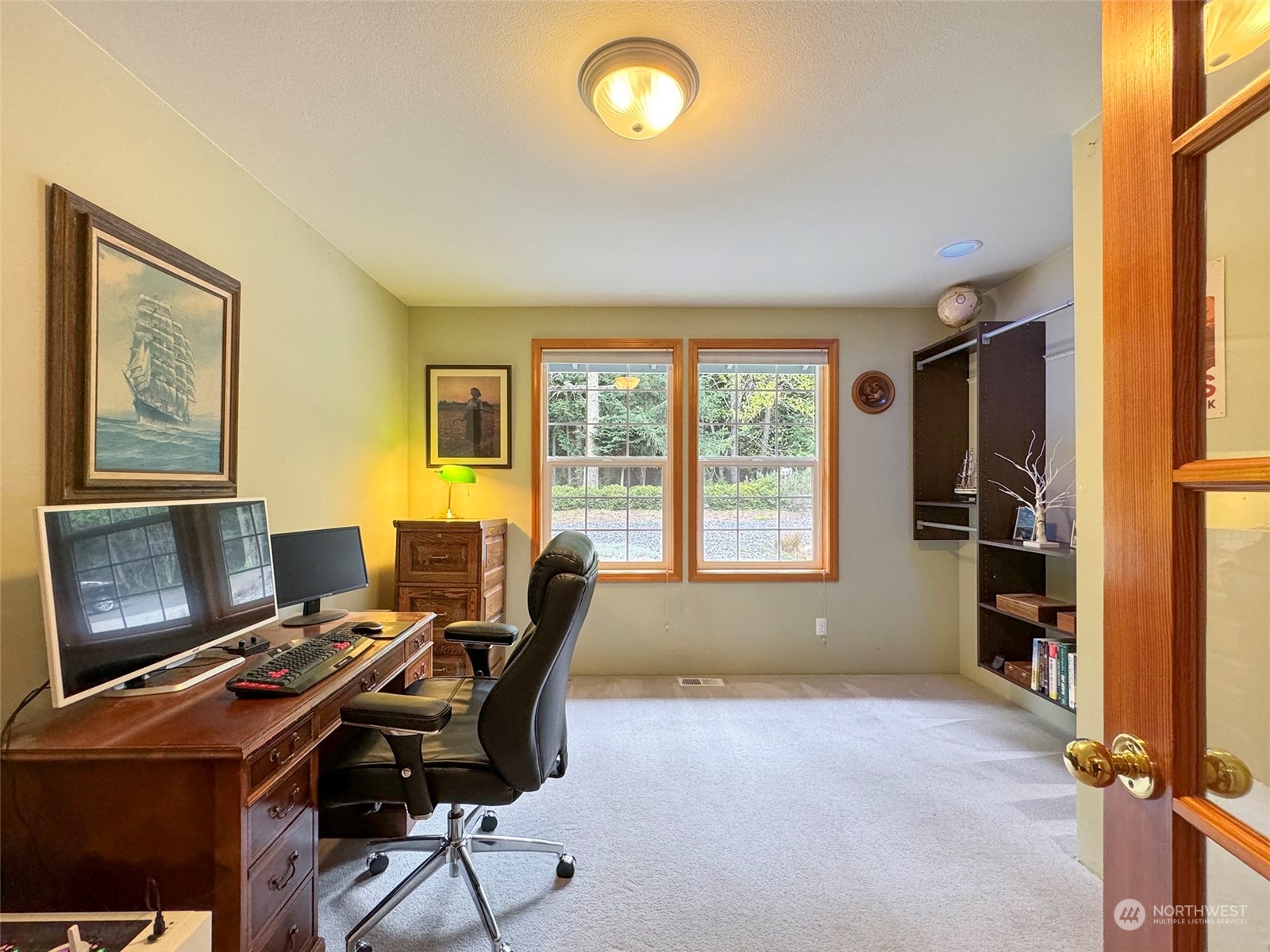 110 Henkes Road Sequim, WA 98382 - Photo 18 of 40 a workspace with furniture and a window