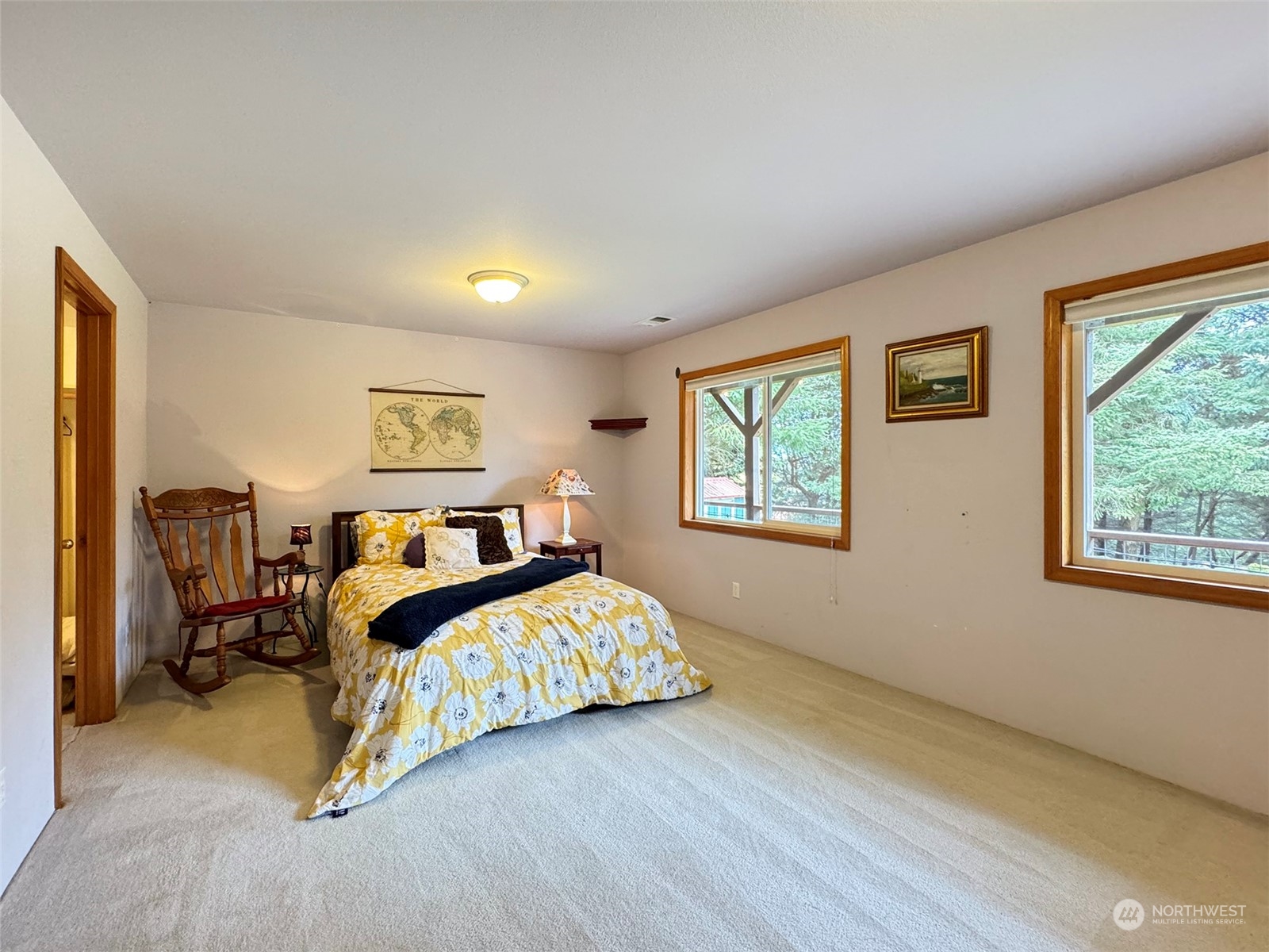 110 Henkes Road Sequim, WA 98382 - Photo 25 of 40 a bedroom with a bed and a window