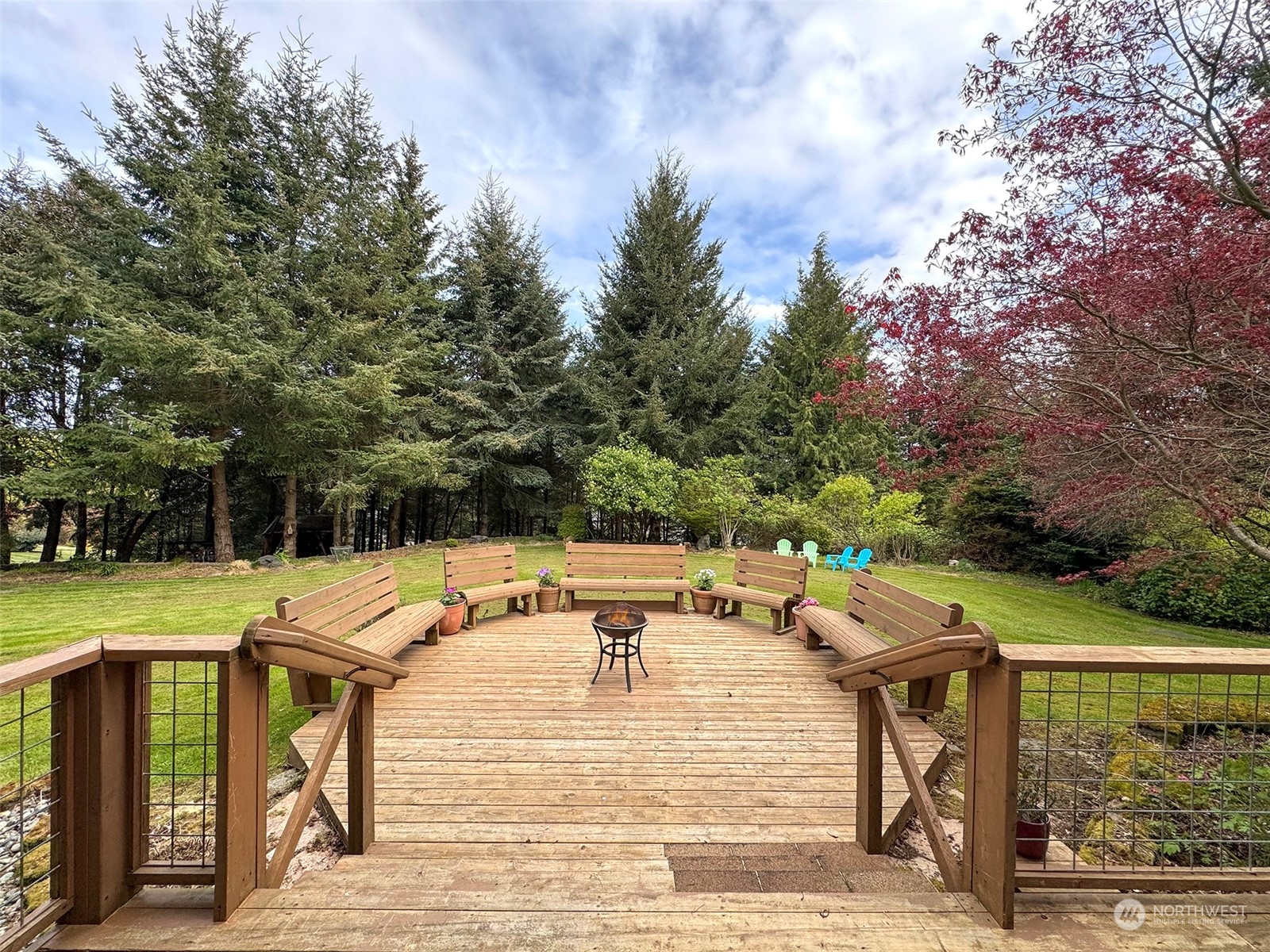 110 Henkes Road Sequim, WA 98382 - Photo 32 of 40 a view of a patio with swimming pool