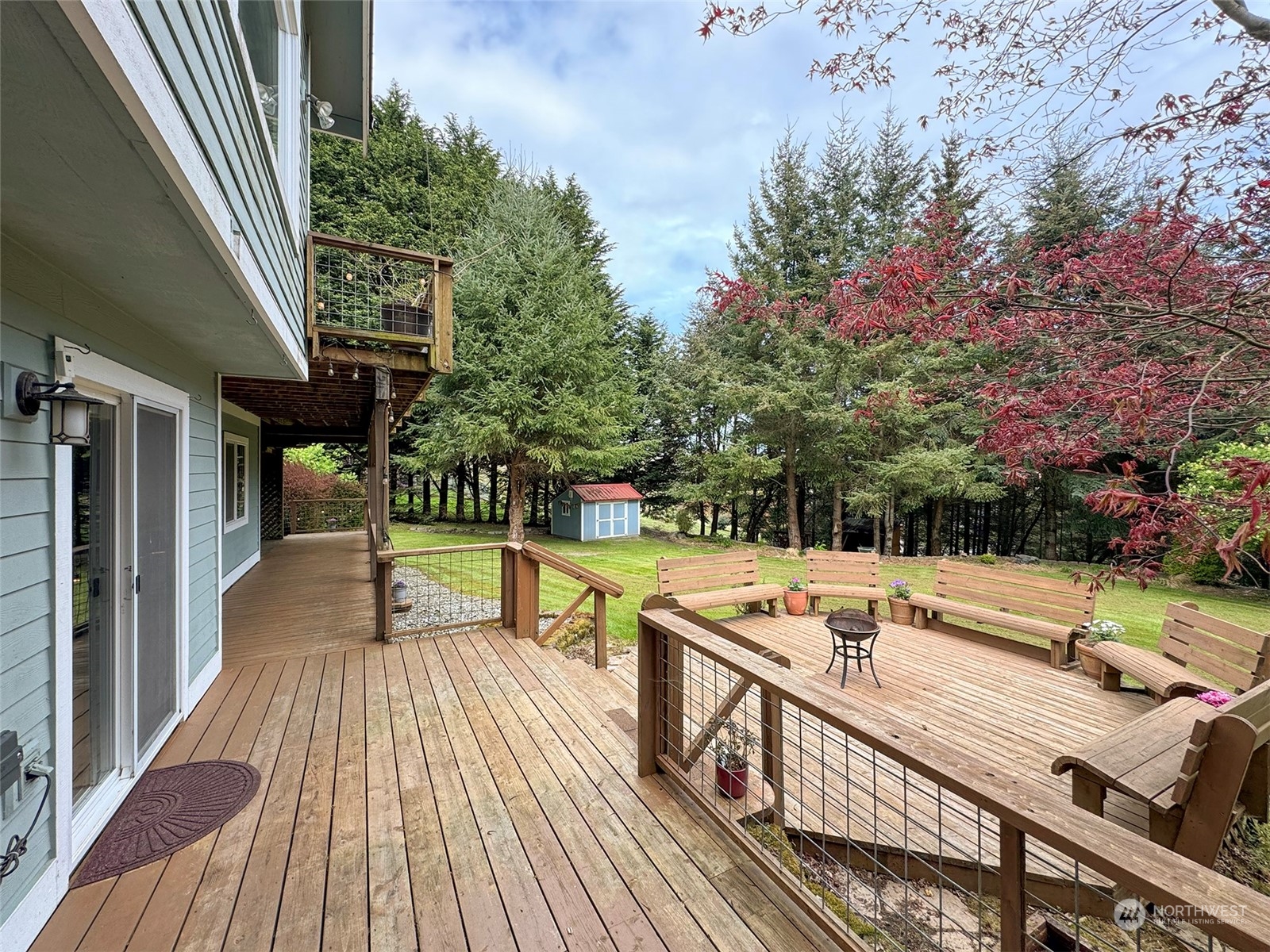 110 Henkes Road Sequim, WA 98382 - Photo 36 of 40 a view of a patio with swimming pool