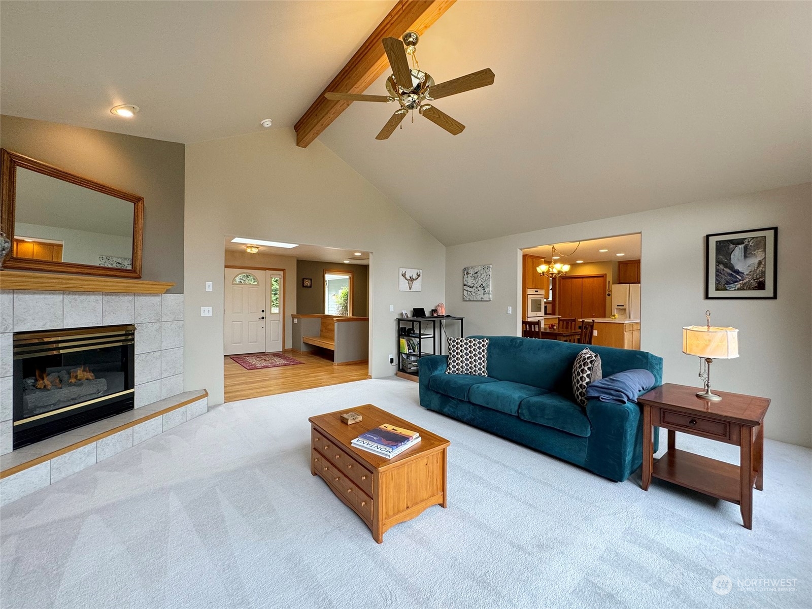 110 Henkes Road Sequim, WA 98382 - Photo 7 of 40 a living room with furniture and a fireplace