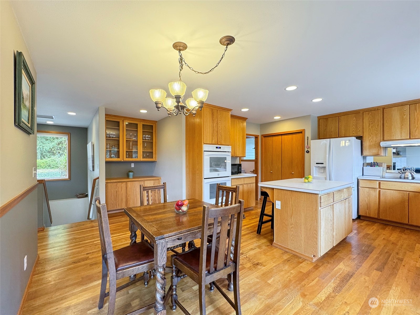 110 Henkes Road Sequim, WA 98382 - Photo 9 of 40 a view of a dining room with furniture and wooden floor