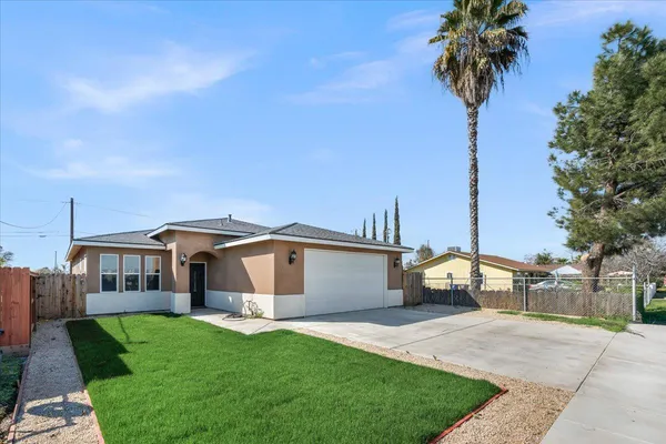 a front view of house with yard