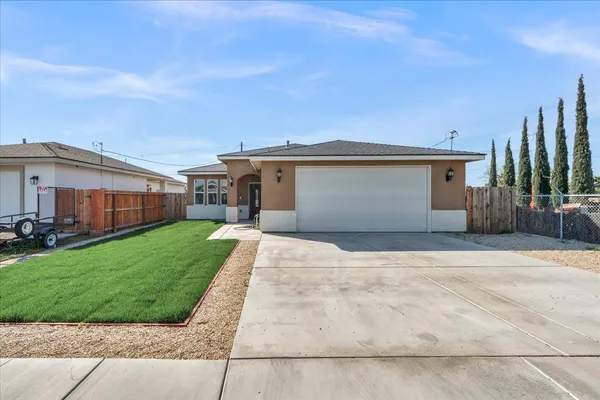 a view of a front of house with a yard
