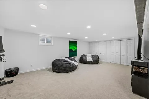 a room with furniture and a flat screen tv