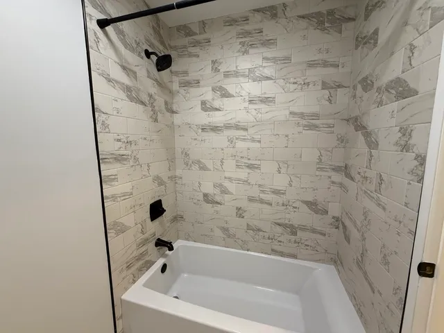 a bathroom with a bathtub