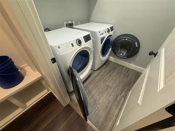 a utility room with dryer and washer