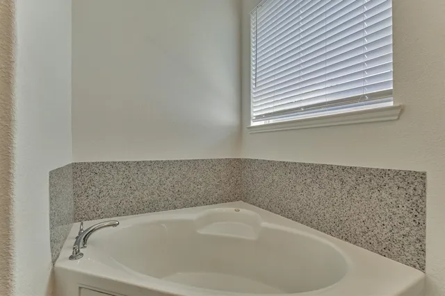 a view of a yard with porch and garden