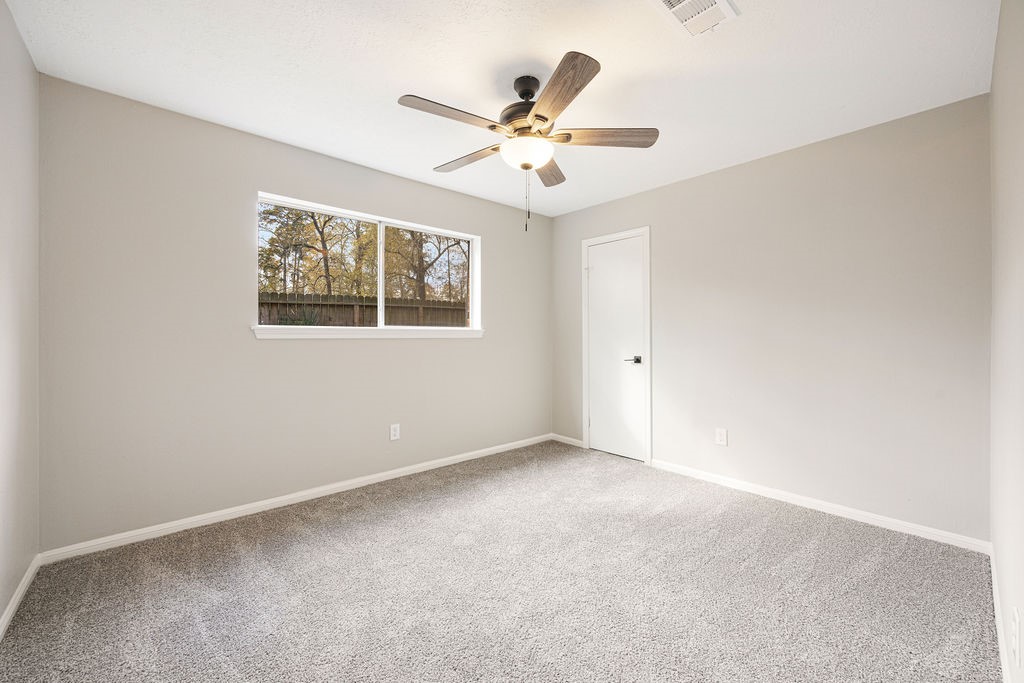 2114 Eagle Point Road Crosby, TX 77532 - Photo 13 of 19 a view of an empty room with a window