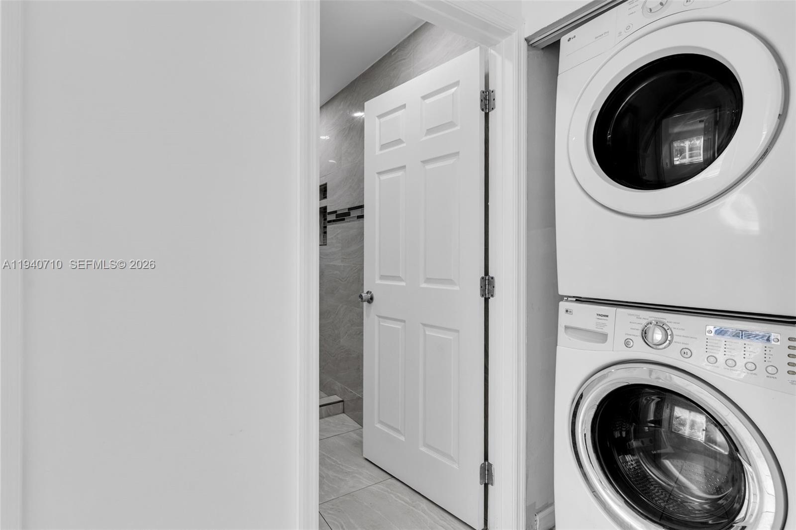 20900 Southwest 118th Avenue Miami, FL 33177 - Photo 13 of 41 a view of a hallway with washer and dryer