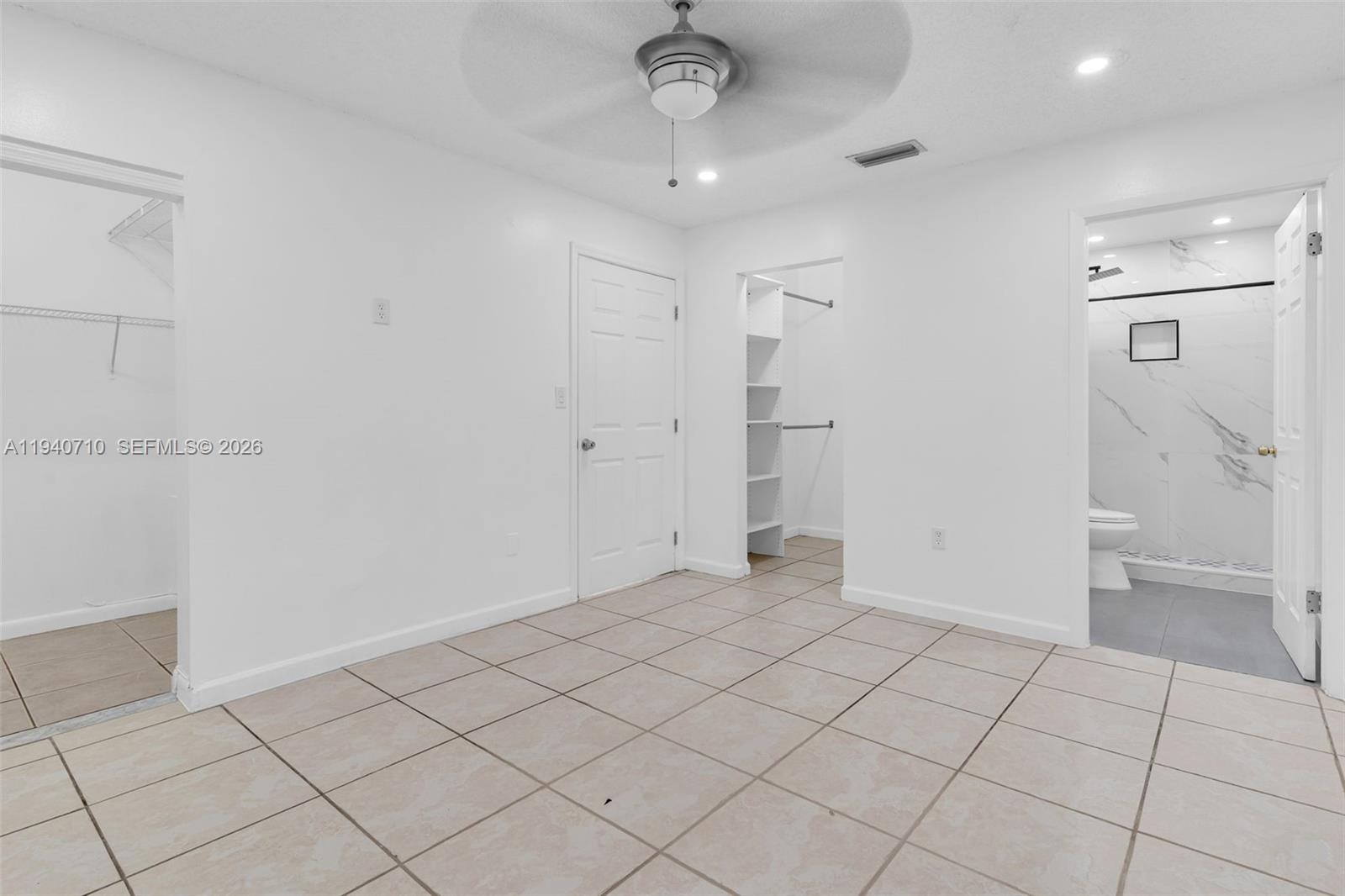 20900 Southwest 118th Avenue Miami, FL 33177 - Photo 18 of 41 a view of an empty room and window