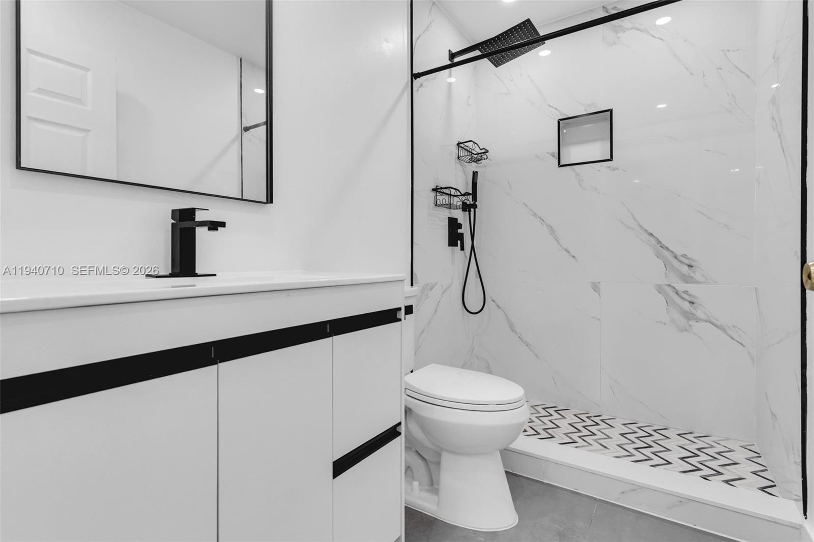 20900 Southwest 118th Avenue Miami, FL 33177 - Photo 21 of 41 a bathroom with a sink a toilet and shower
