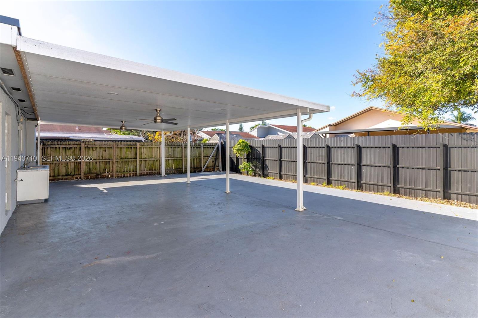 20900 Southwest 118th Avenue Miami, FL 33177 - Photo 26 of 41 a view of a house with a garage