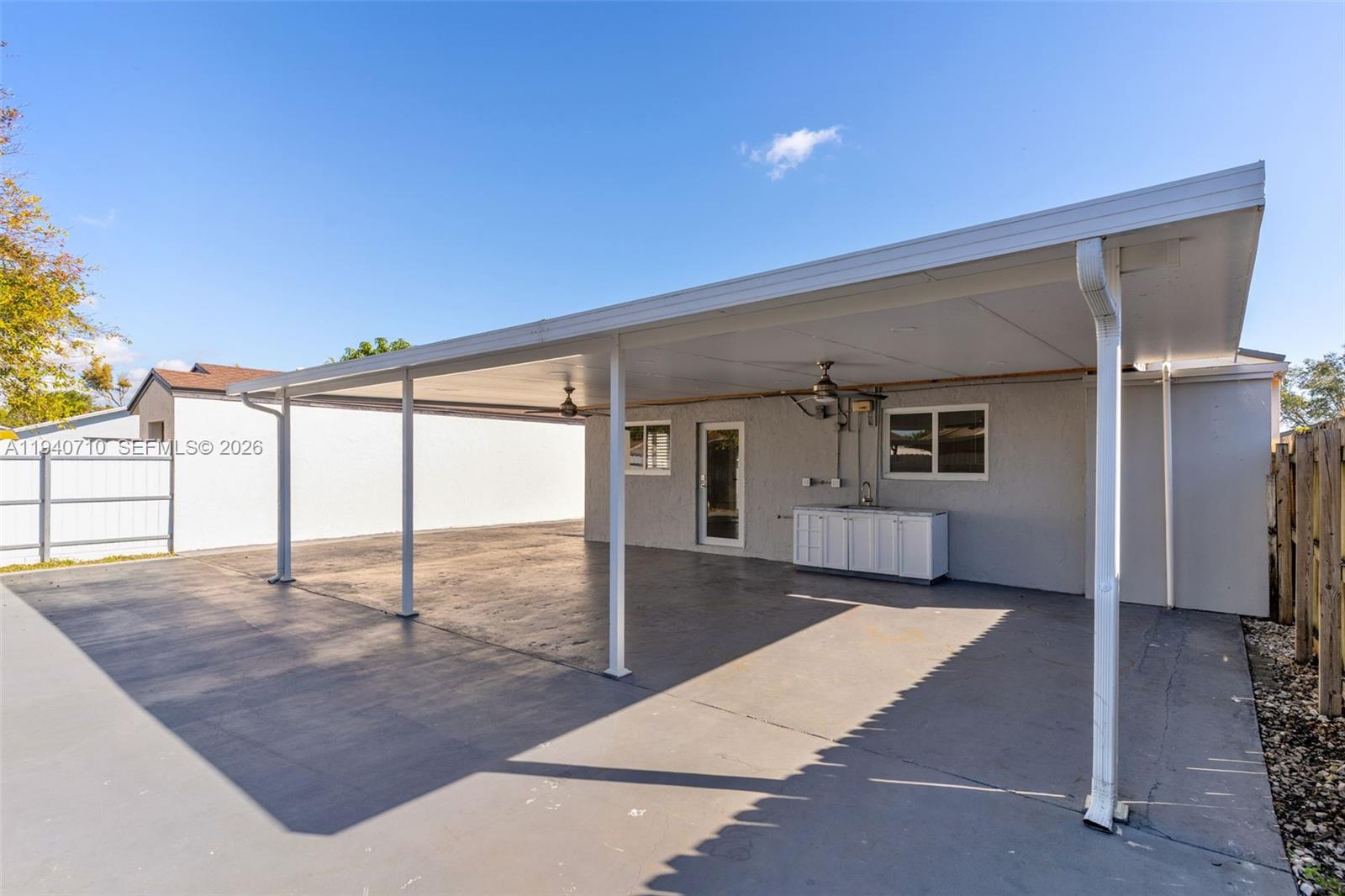 20900 Southwest 118th Avenue Miami, FL 33177 - Photo 28 of 41 a view of a backyard of the house