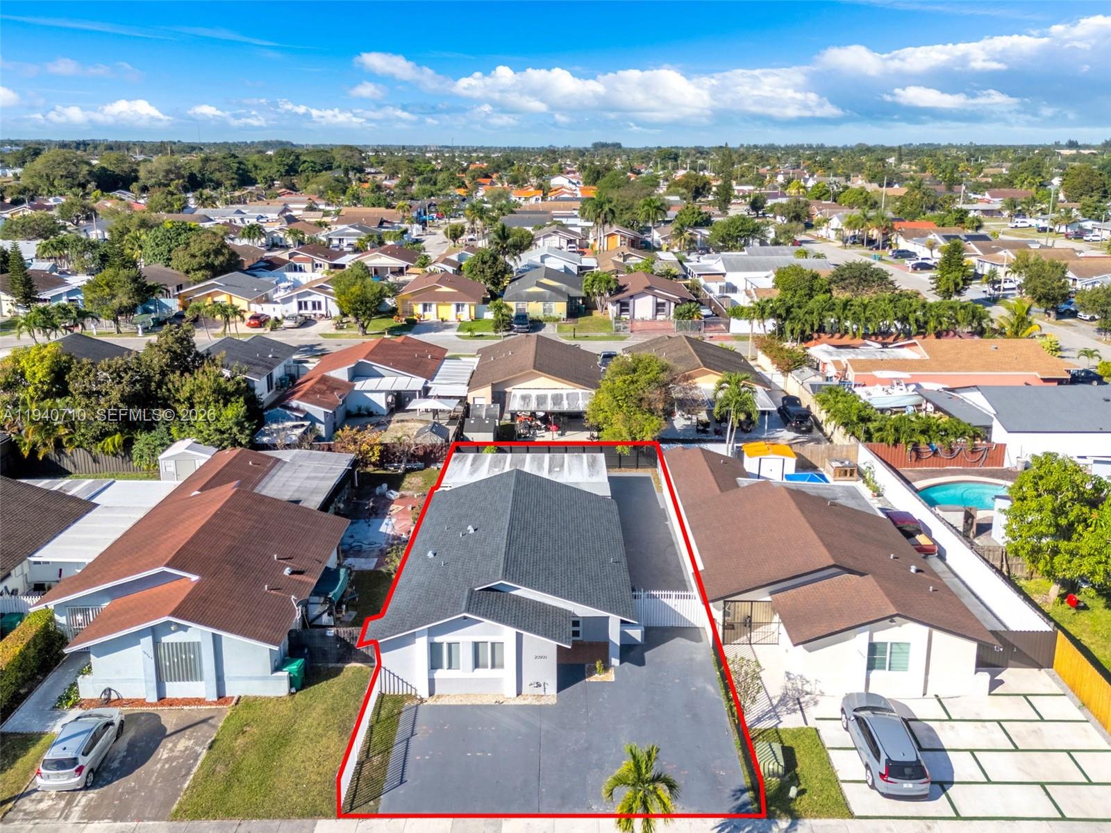 20900 Southwest 118th Avenue Miami, FL 33177 - Photo 30 of 41 an aerial view of residential houses with outdoor space
