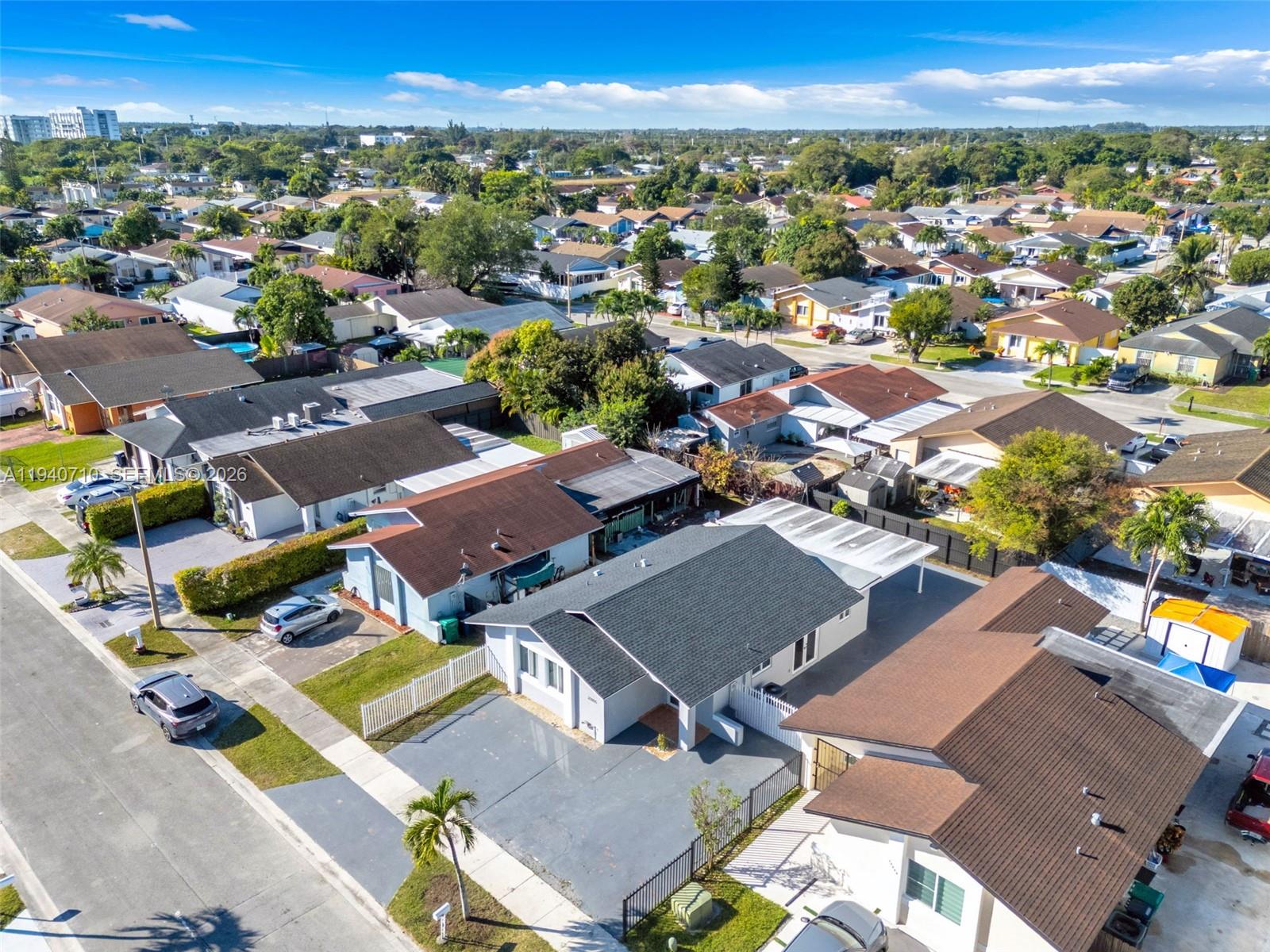 20900 Southwest 118th Avenue Miami, FL 33177 - Photo 33 of 41 an aerial view of residential houses with outdoor space