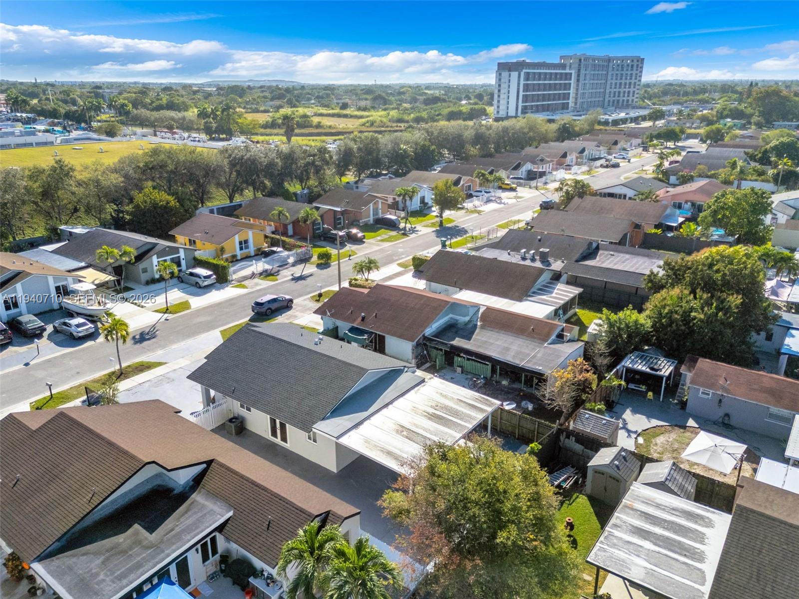 20900 Southwest 118th Avenue Miami, FL 33177 - Photo 35 of 41 an aerial view of a city with lots of residential buildings