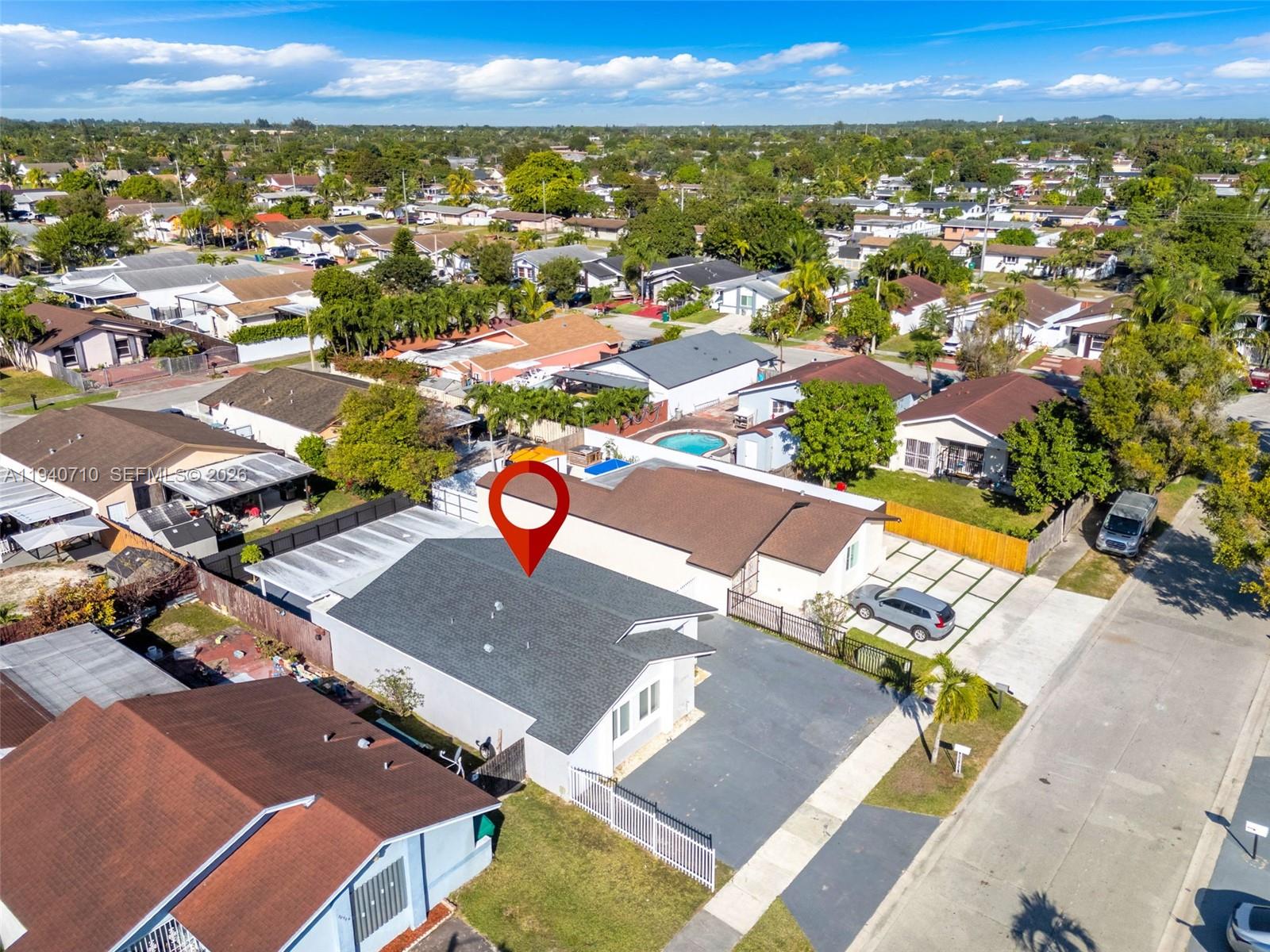 20900 Southwest 118th Avenue Miami, FL 33177 - Photo 40 of 41 an aerial view of residential houses with outdoor space