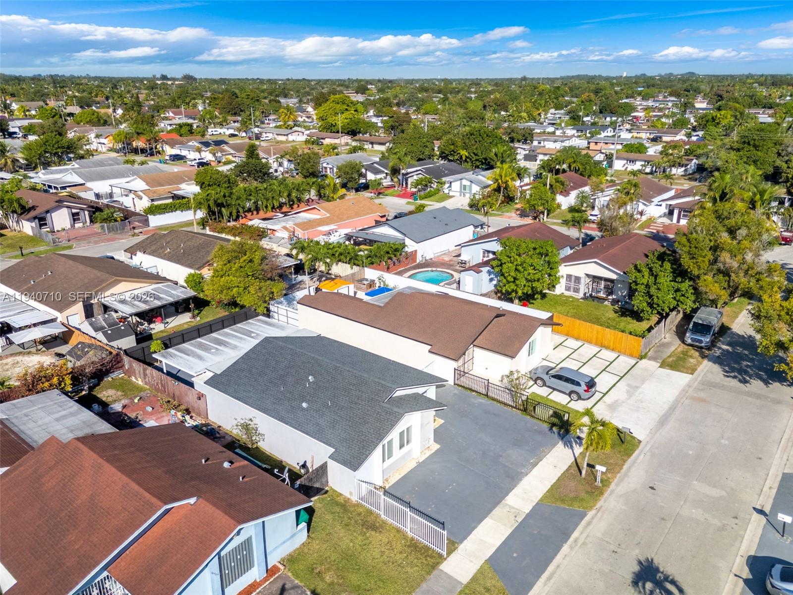 20900 Southwest 118th Avenue Miami, FL 33177 - Photo 41 of 41 an aerial view of residential houses with outdoor space
