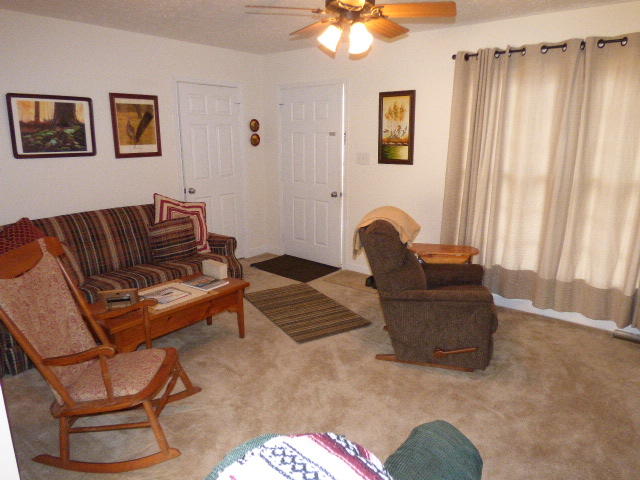 435 Endicott Hill Road Ferrum, VA 24088 - Photo 12 of 22 a living room with furniture and a window