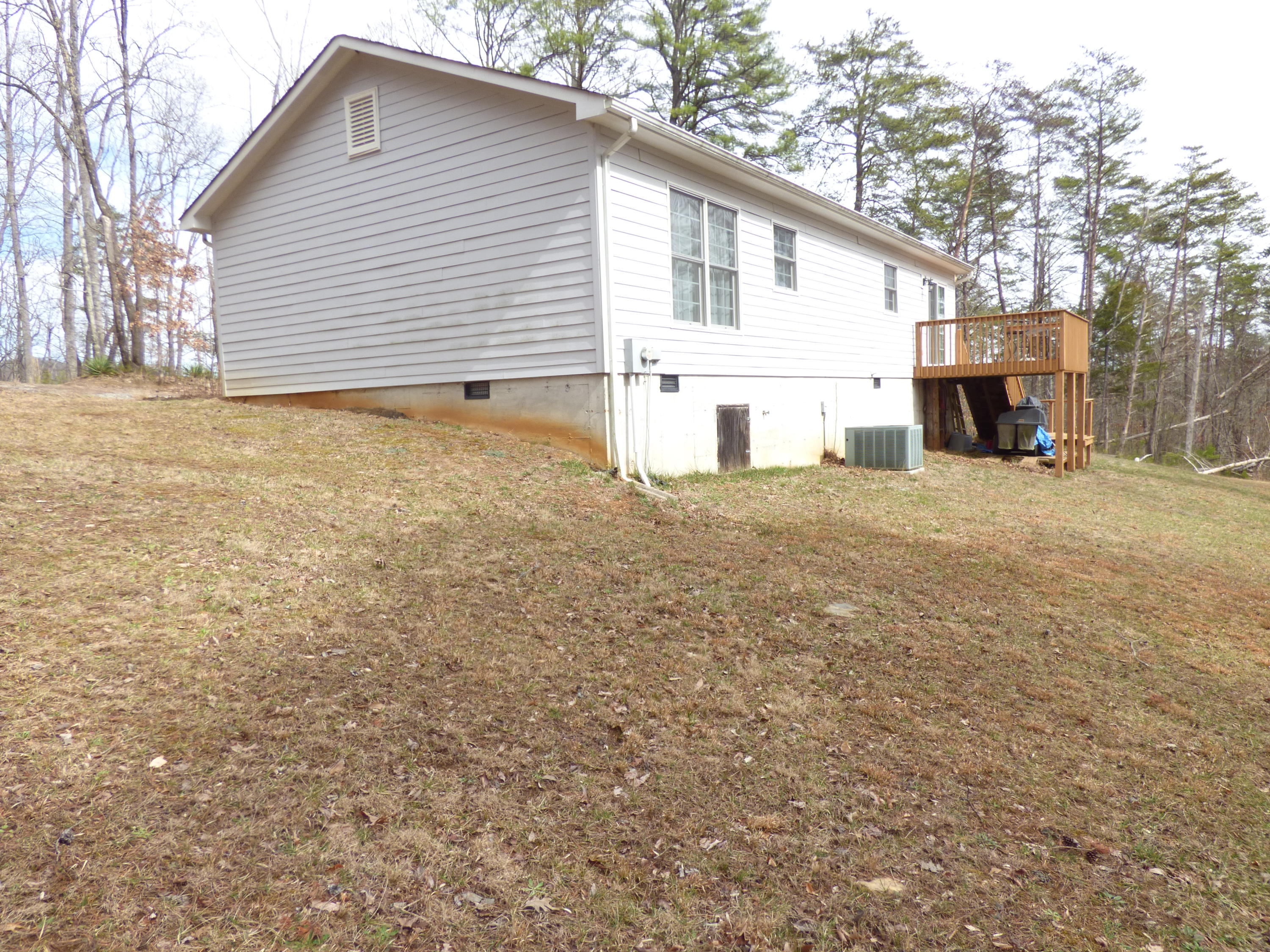 435 Endicott Hill Road Ferrum, VA 24088 - Photo 4 of 22 a house with a yard