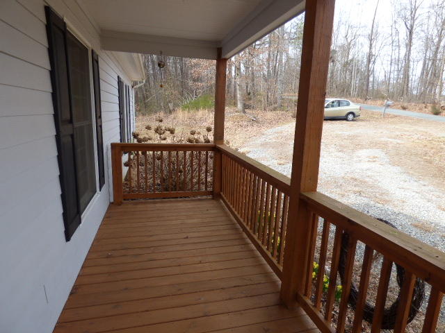 435 Endicott Hill Road Ferrum, VA 24088 - Photo 5 of 22 a view of a balcony with wooden floor