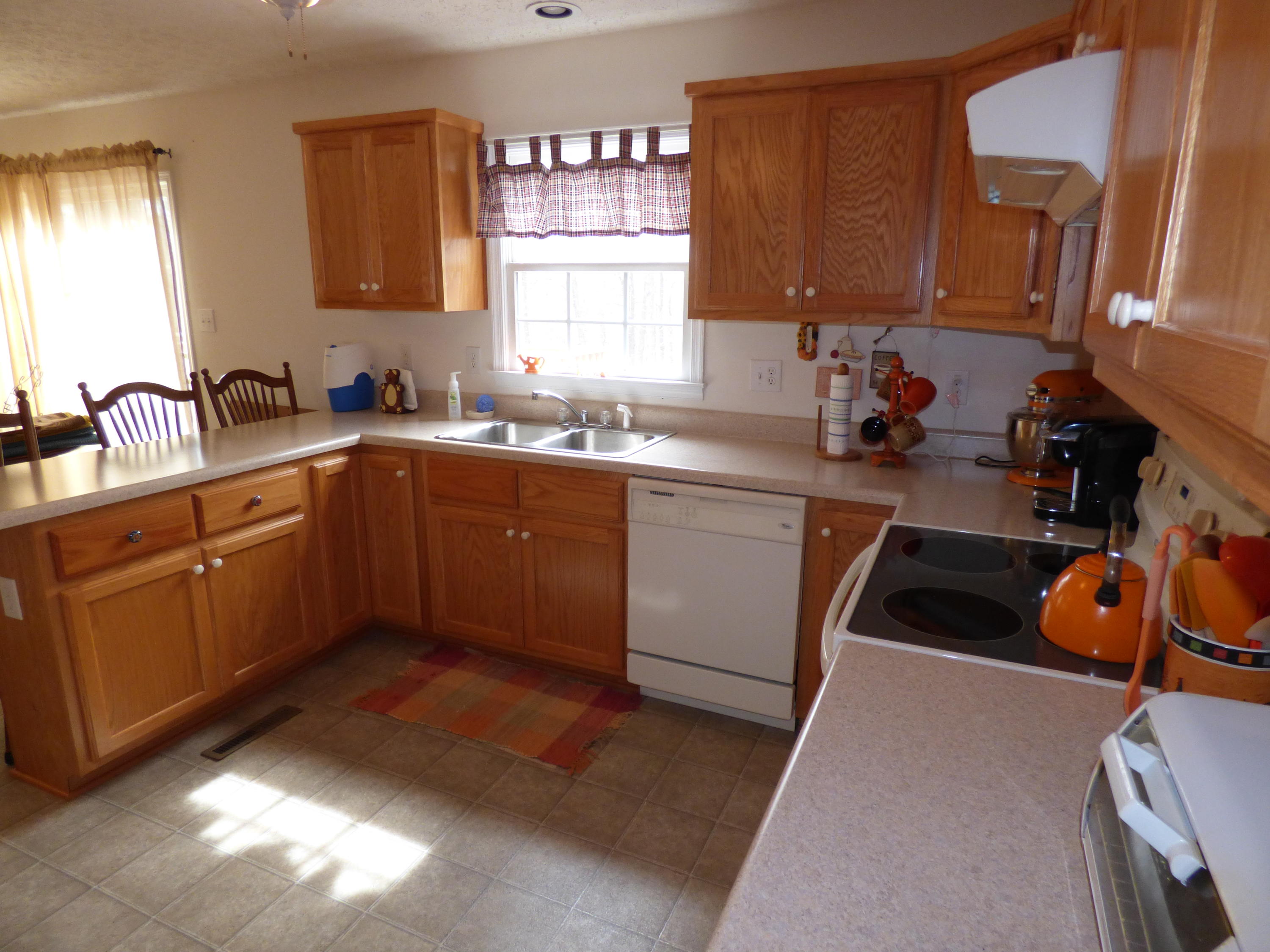 435 Endicott Hill Road Ferrum, VA 24088 - Photo 8 of 22 a kitchen with a sink cabinets and window