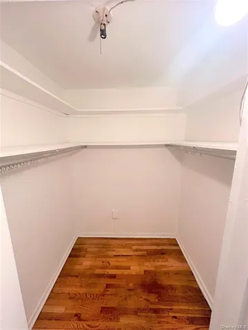 a view of a room with racks on the wall