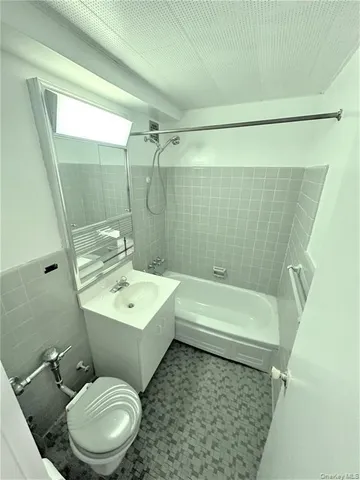 a bathroom with a sink and a shower