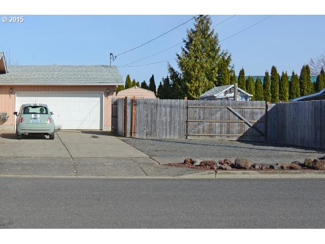 3504 E Street Springfield, OR 97478 - Photo 15 of 16 a view of a street with cars