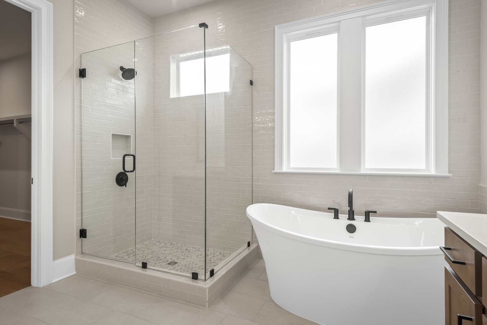 7221 Severide Street Fairview, TN 37062 - Photo 31 of 59 a white bath tub sitting next to a shower