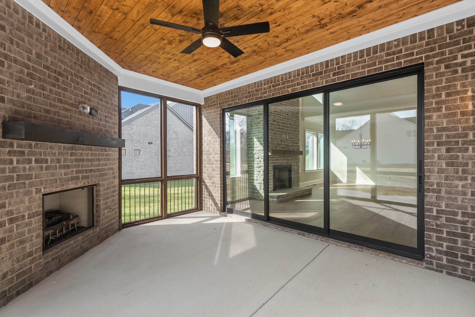7221 Severide Street Fairview, TN 37062 - Photo 56 of 59 a view of an empty room with a fireplace and a window