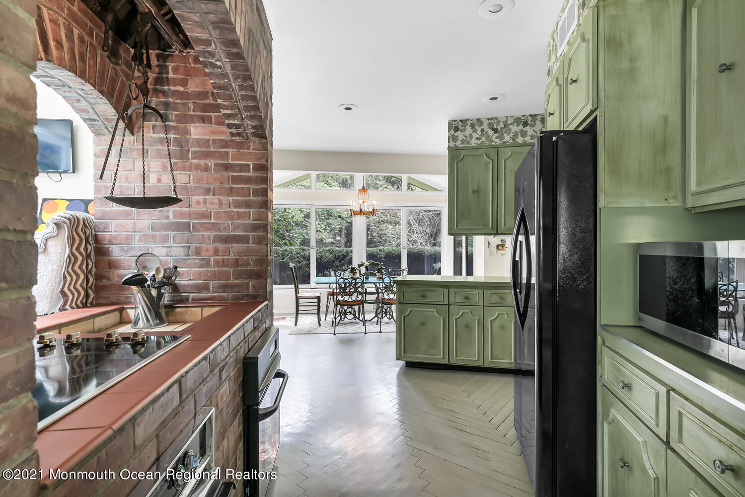 136 Rumson Road Rumson, NJ 07760 - Photo 11 of 26 a kitchen with sink refrigerator and outdoor view