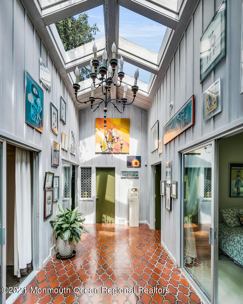 136 Rumson Road Rumson, NJ 07760 - Photo 14 of 26 a view of a building with a porch