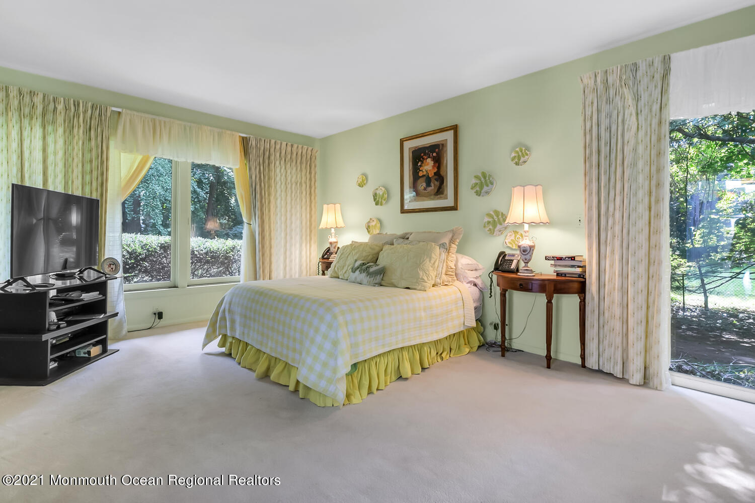136 Rumson Road Rumson, NJ 07760 - Photo 15 of 26 a spacious bedroom with a bed and large windows