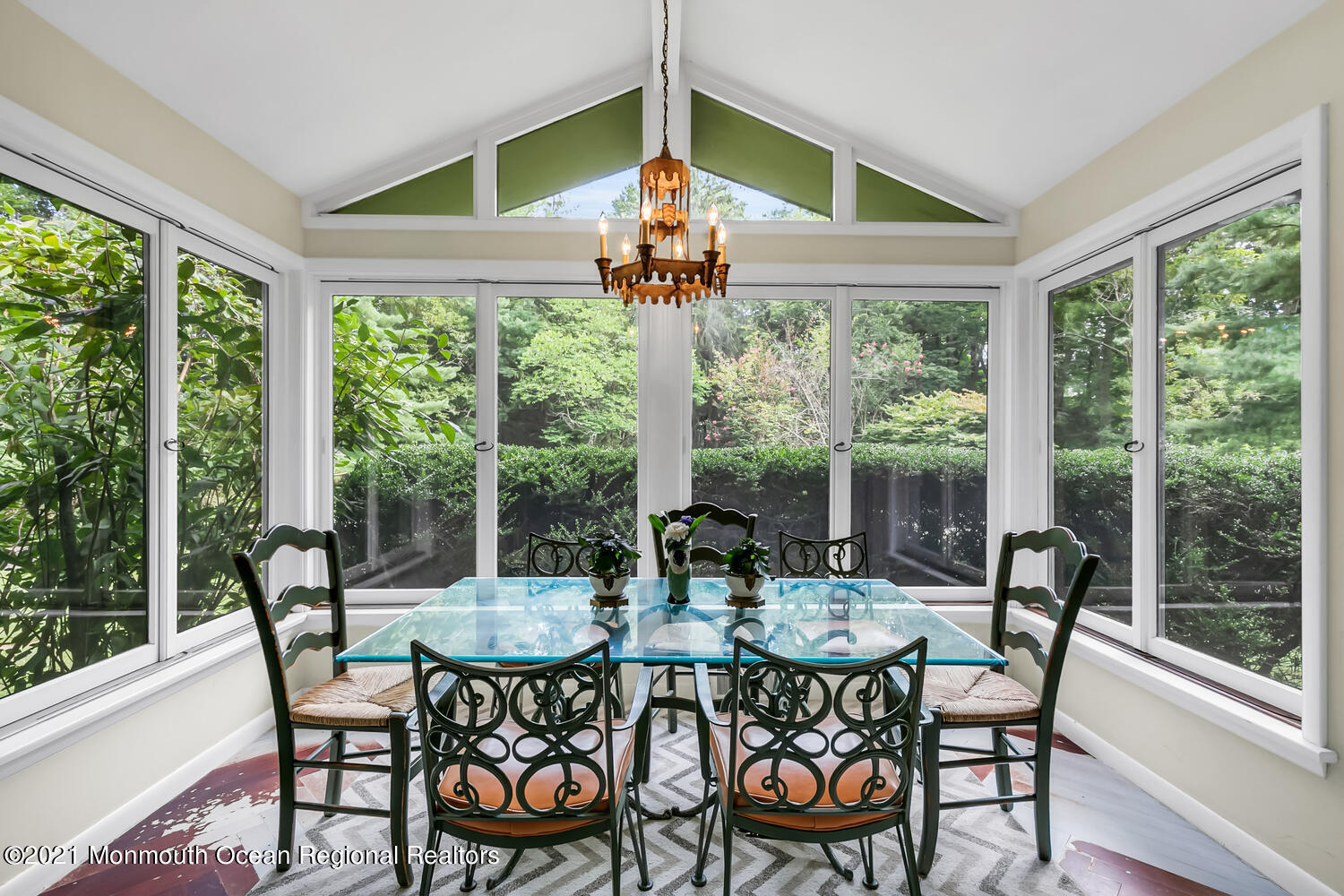136 Rumson Road Rumson, NJ 07760 - Photo 6 of 26 a view of a dining room with furniture wooden floor and a chandelier