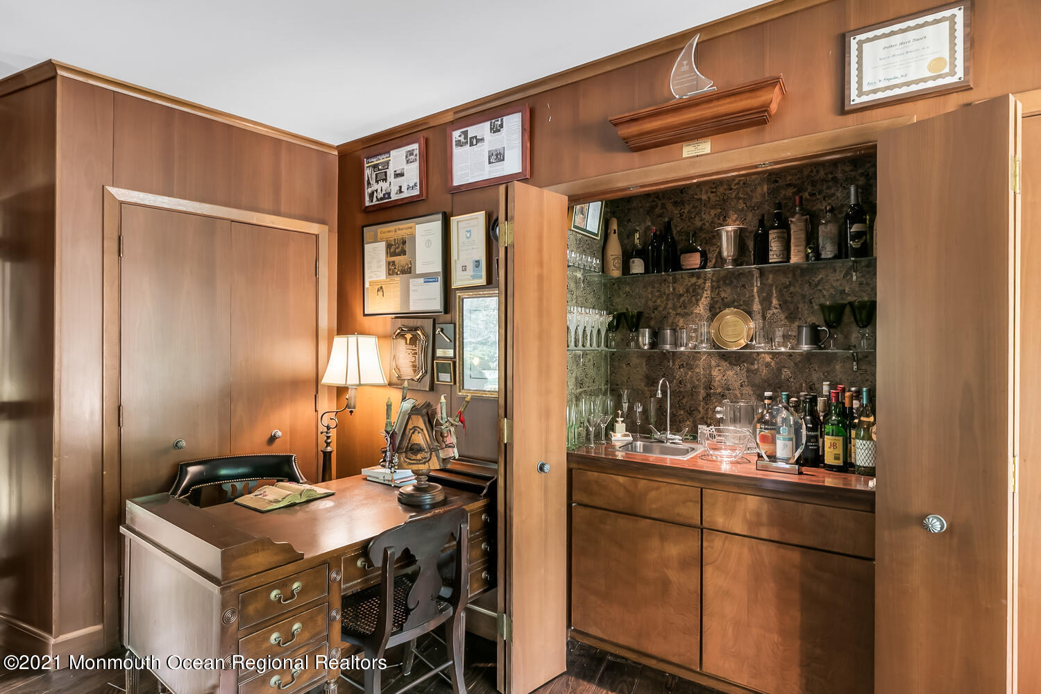 136 Rumson Road Rumson, NJ 07760 - Photo 9 of 26 a kitchen with a refrigerator and cabinets