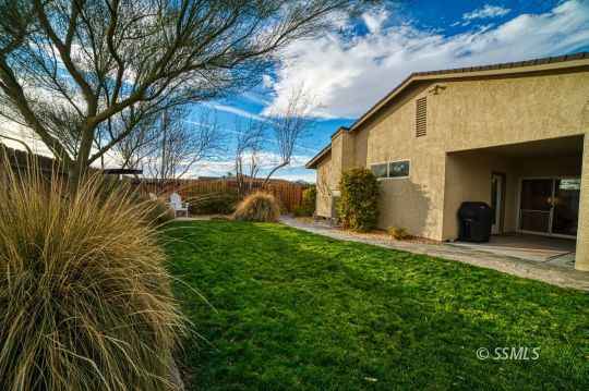 925 West Coronado Avenue Ridgecrest, CA 93555 - Photo 32 of 33 a view of a backyard of the house